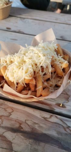 Watering Hole Cheesy Chips.
Credit: Luke Newnham - 2019 Perranporth Beach cheesy chips Newquay Cornwall