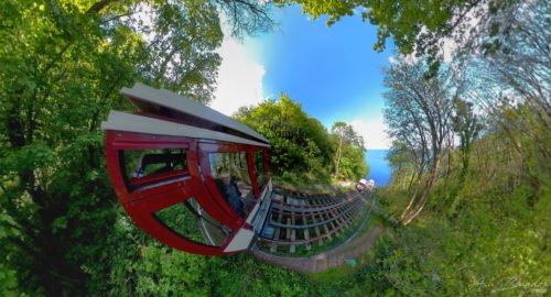 Railway car down a cliff to a beach
