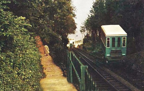 Cable car with trees and sea in the background Babbacombe Cliff Railway, Torquay - History