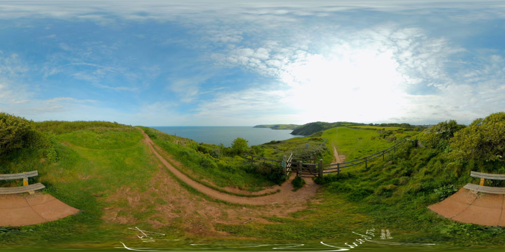 View looking over sea from a bench