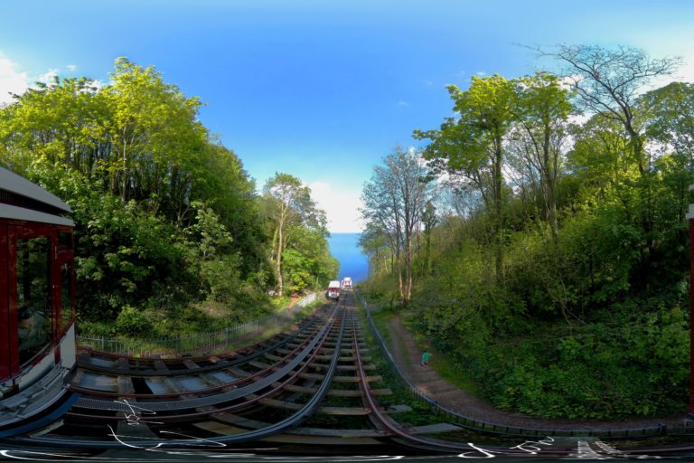 Railway car down a cliff to a beach