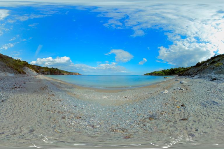 Brixham beach with blue sky