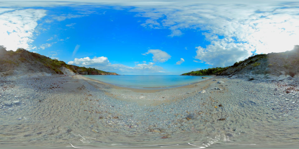 Brixham beach with blue sky