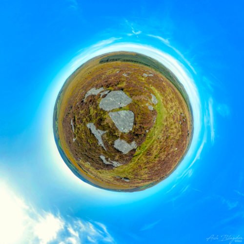 Overlooking moorland, forest and Blue skies