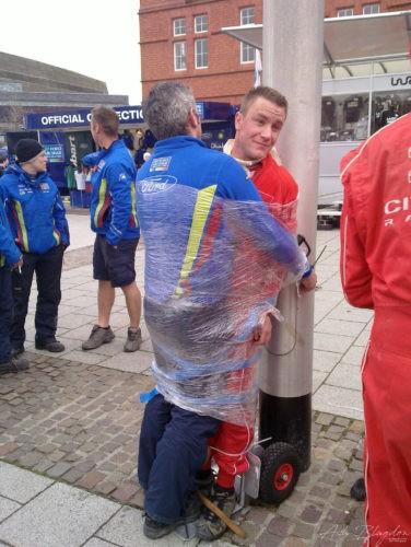 Ford Citreon Mechanics tied to a pole Rally GB 2010 Cardiff Ford Citreon Mechanics tied to a pole Rally GB 2010 Cardiff